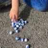 Tout Pour le Jeu 20 Billes ozone bleues et blanches 16 mm + 1 calot 25 mm