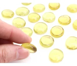 Tout Pour le Jeu 20 galets gems 15/22 mm jaune translucide - mini pierres plates