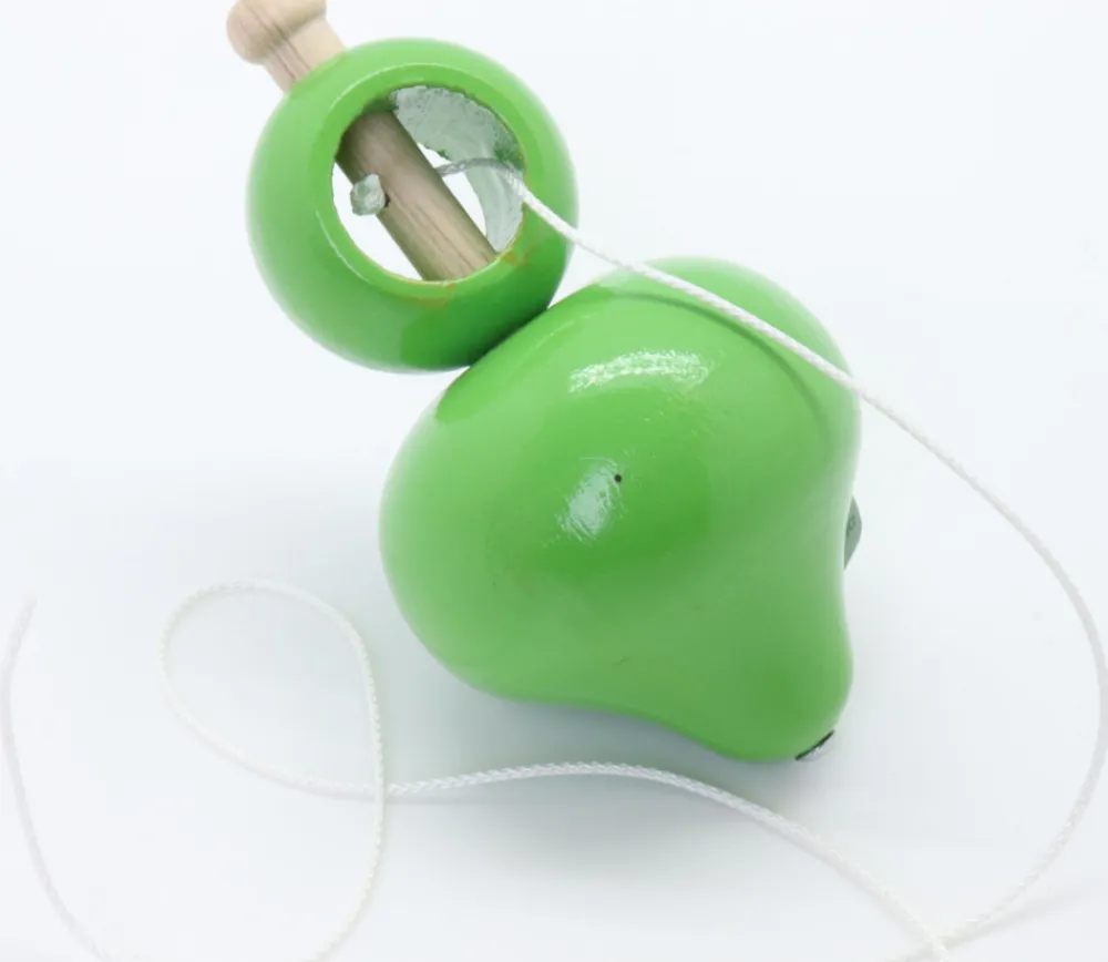 Tout Pour le Jeu Grosse toupie bois 10 cm avec lanceur ficelle