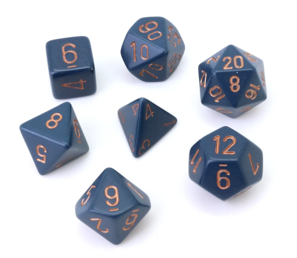 Tout Pour le Jeu Set 7 dés multi-faces bleu-gris chiffres dorés.