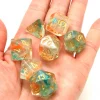 Tout Pour le Jeu Set 7 dés multi-faces translucide et vert pailletés